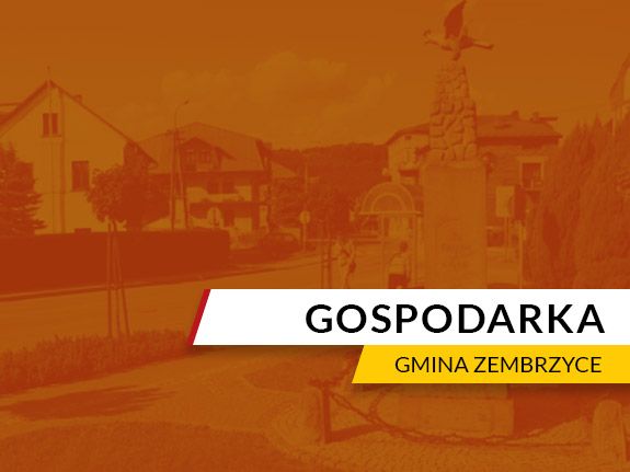 Obrazek przedstawia napis: Gospodarka Gmina Zembrzyce przedstawiony na pomarańczowym tle